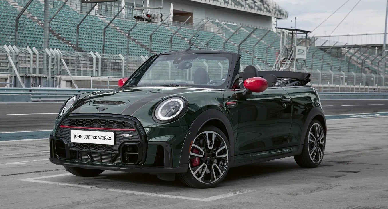 The JCW MINI Convertible zooming on the racetrack. | MINI of Montgomery County in Gaithersburg MD